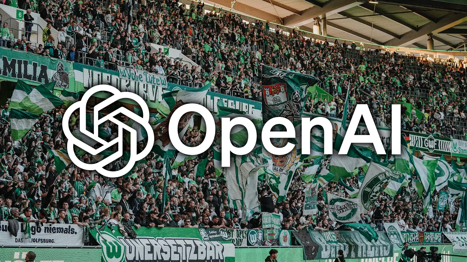 Ein Bild von Wolfsburg Fans mit OpenAI Logo